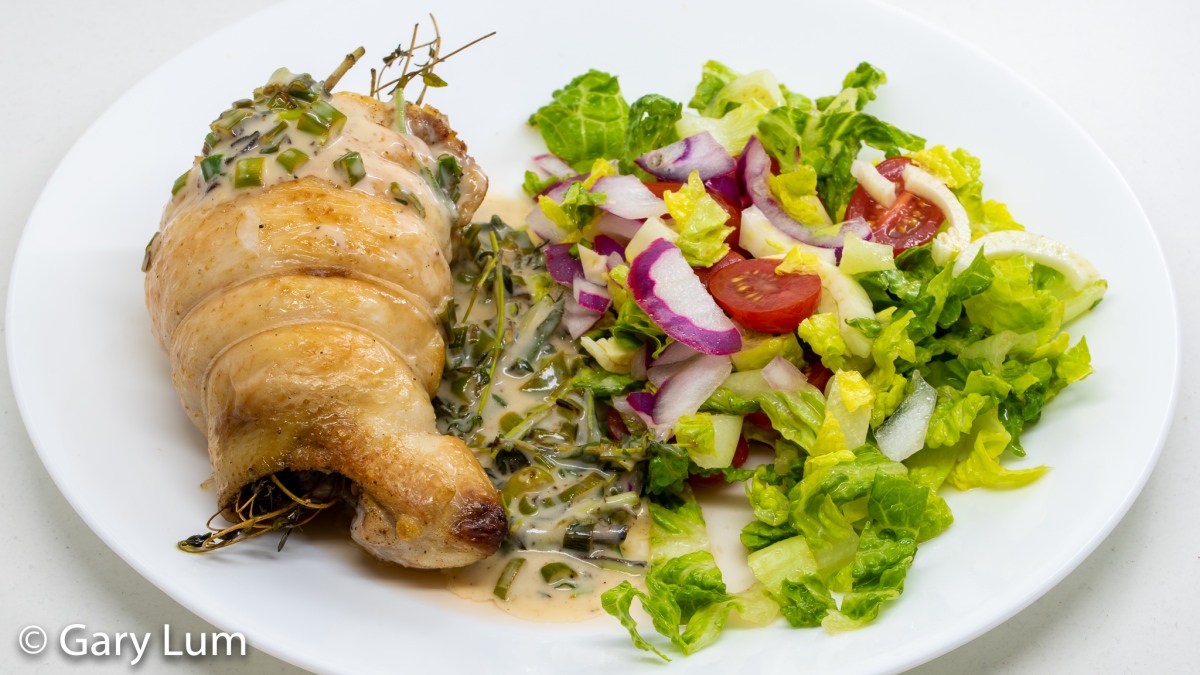 Deboned chicken thigh rolled around Spam with simple gravy and salad. Gary Lum.