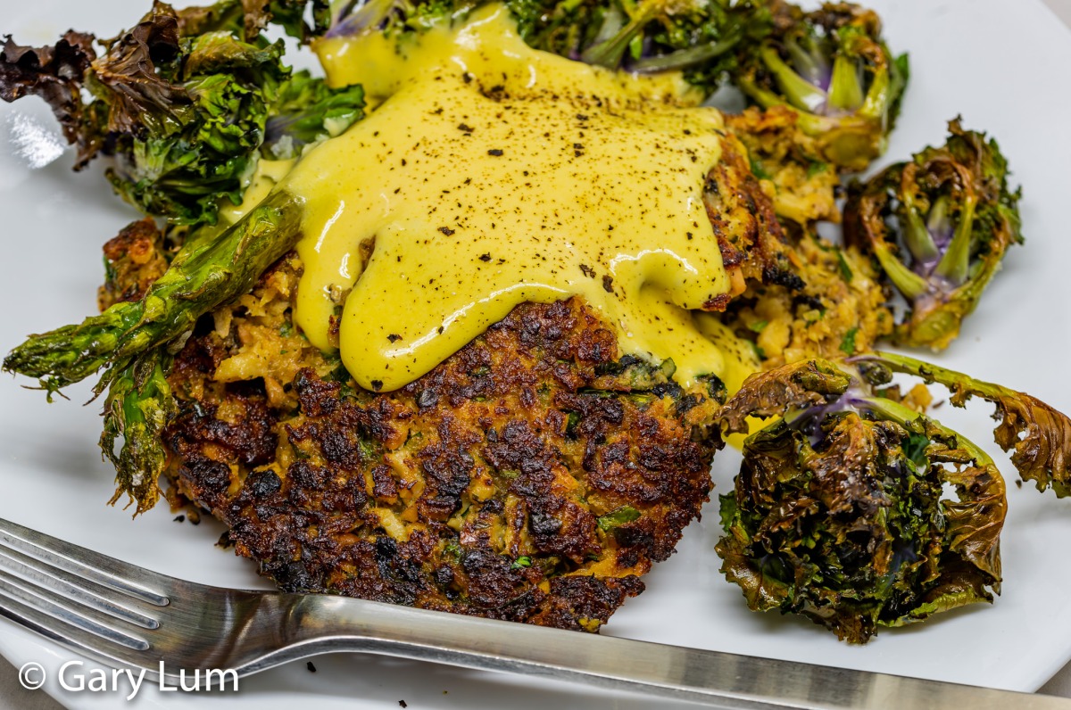 Leftover tuna cakes and hollandaise sauce with oven-cooked asparagus and kale sprouts.